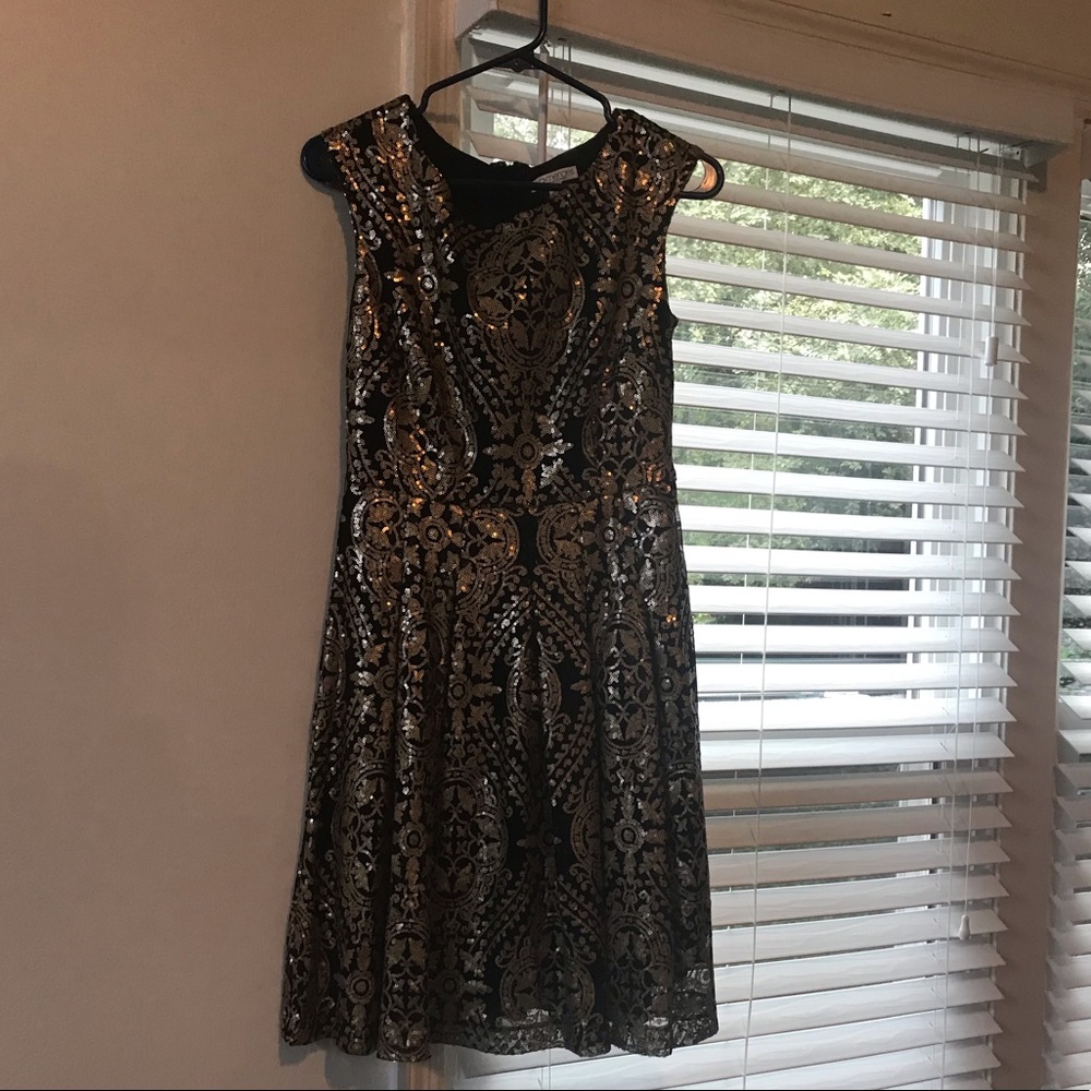 Black dress with gold sequins